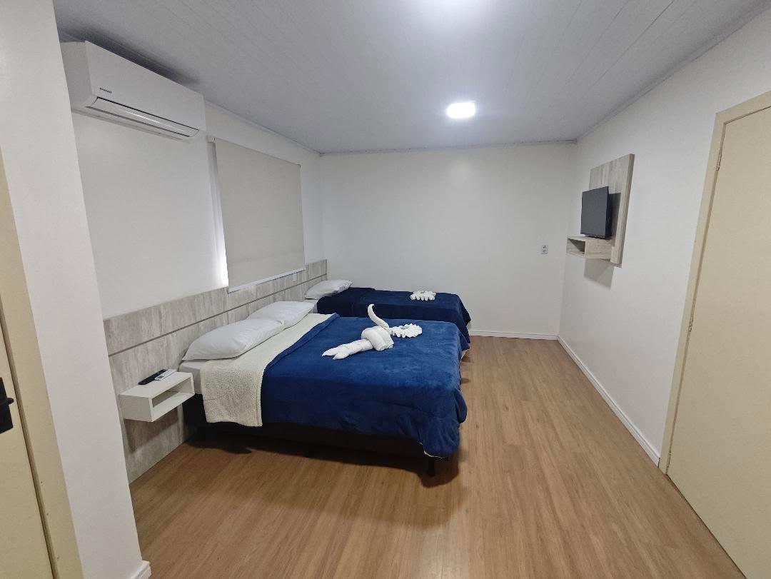 Imagem do quarto Suite tripla